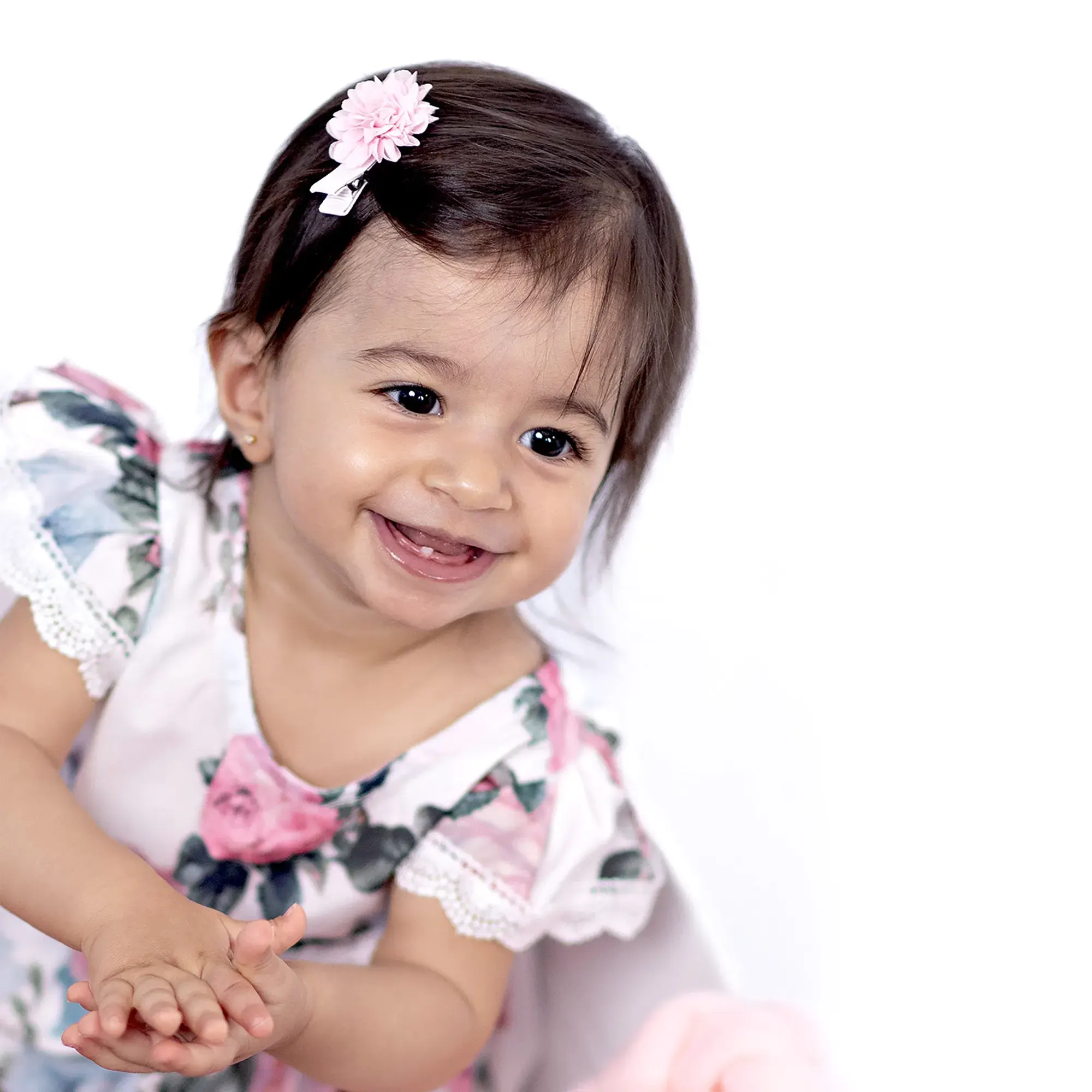 Baby girl with cute bow at Sky Portraits, Sydney - baby photographer