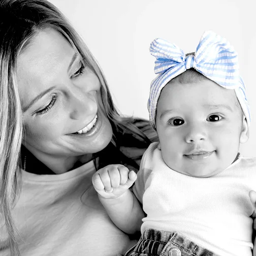 Laughing infant's candid studio shot in Sydney, Australia - candid baby photography