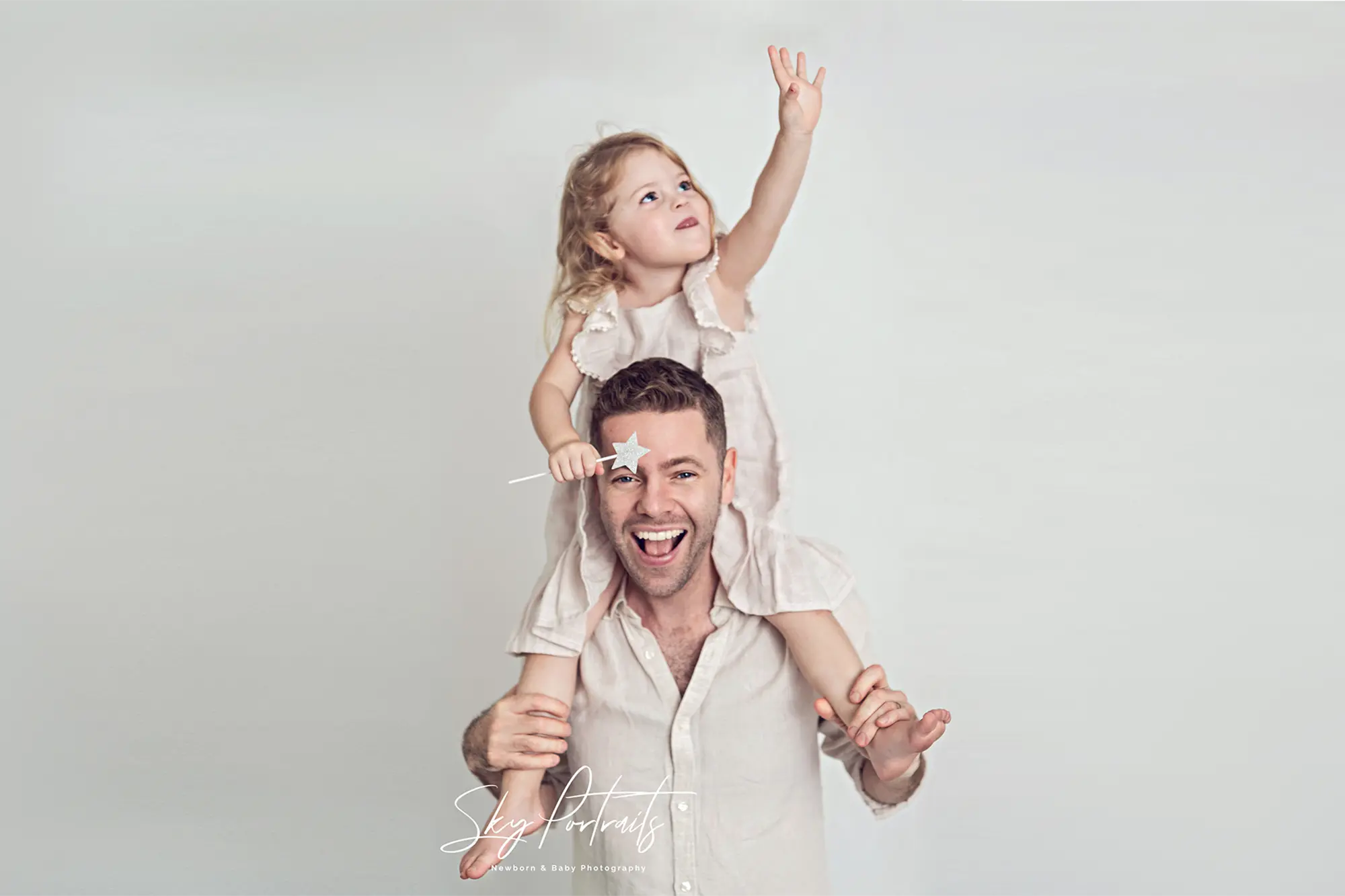 Siblings playing in studio setup at Sky Portraits, St Leonards, Sydney - children's photographer