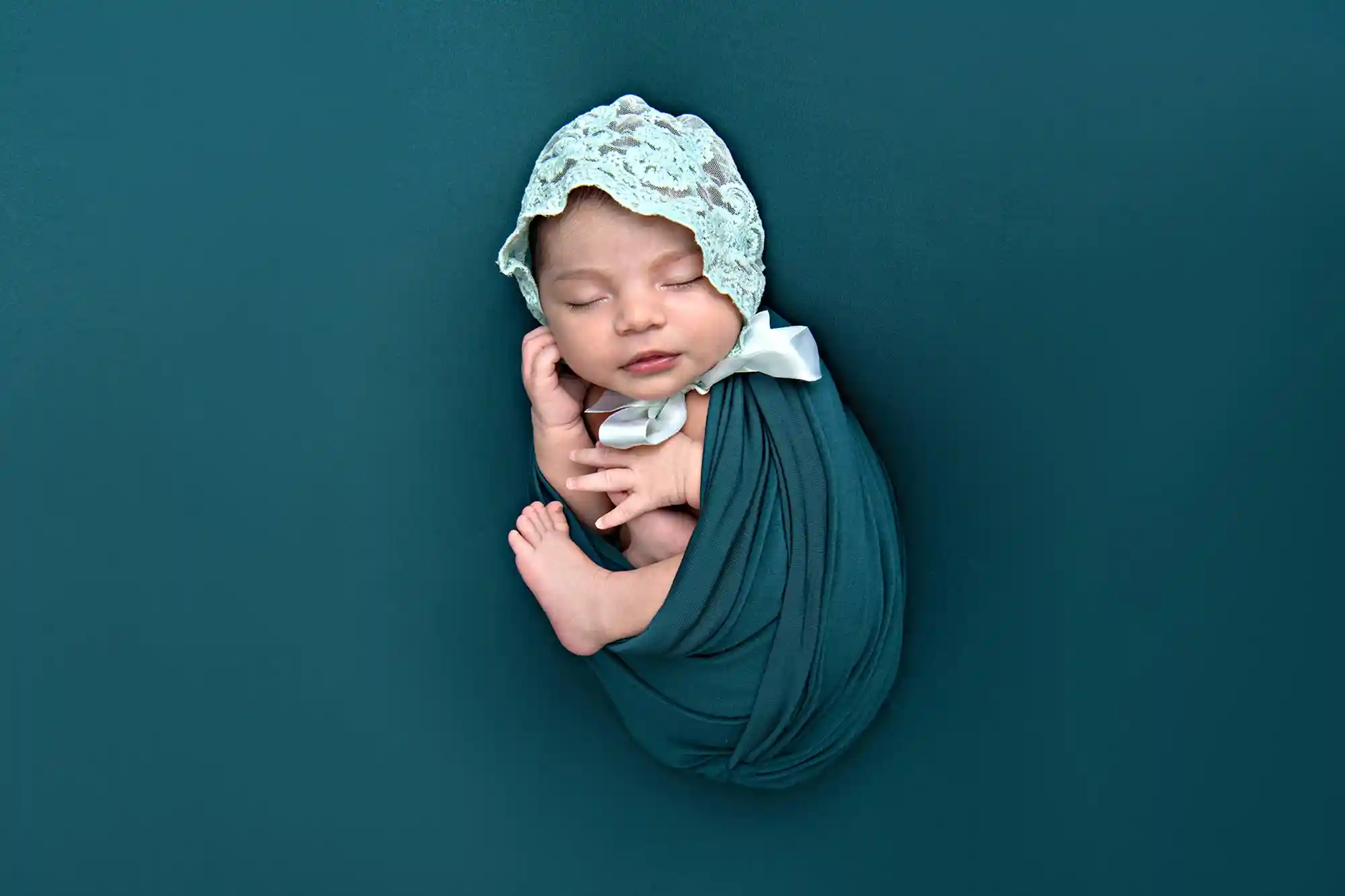 Peaceful newborn resting on fur throw at Sky Portraits Studio, Sydney - newborn photography