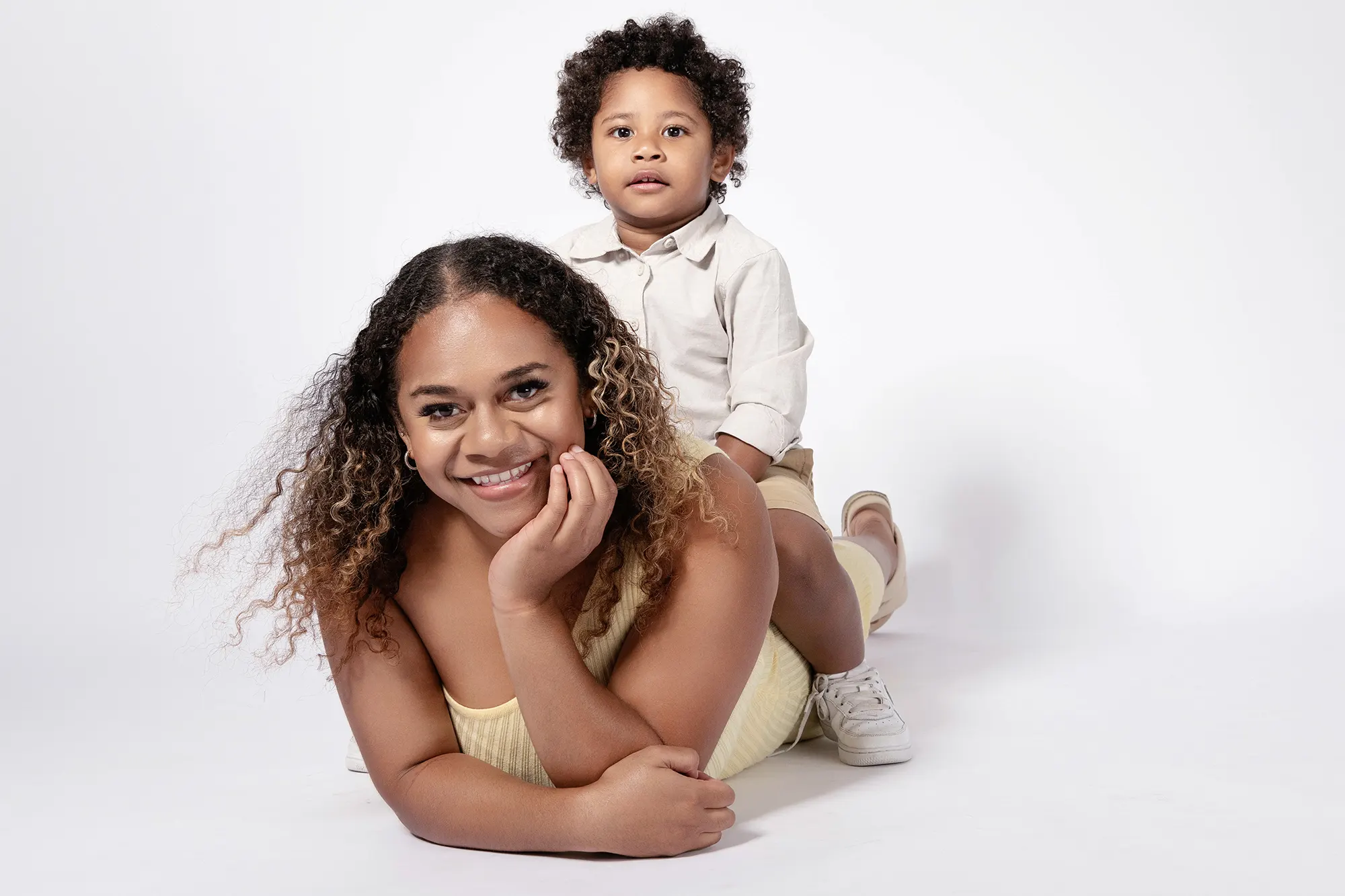 Baby boy having a fun time during his photo session at Sky Portraits