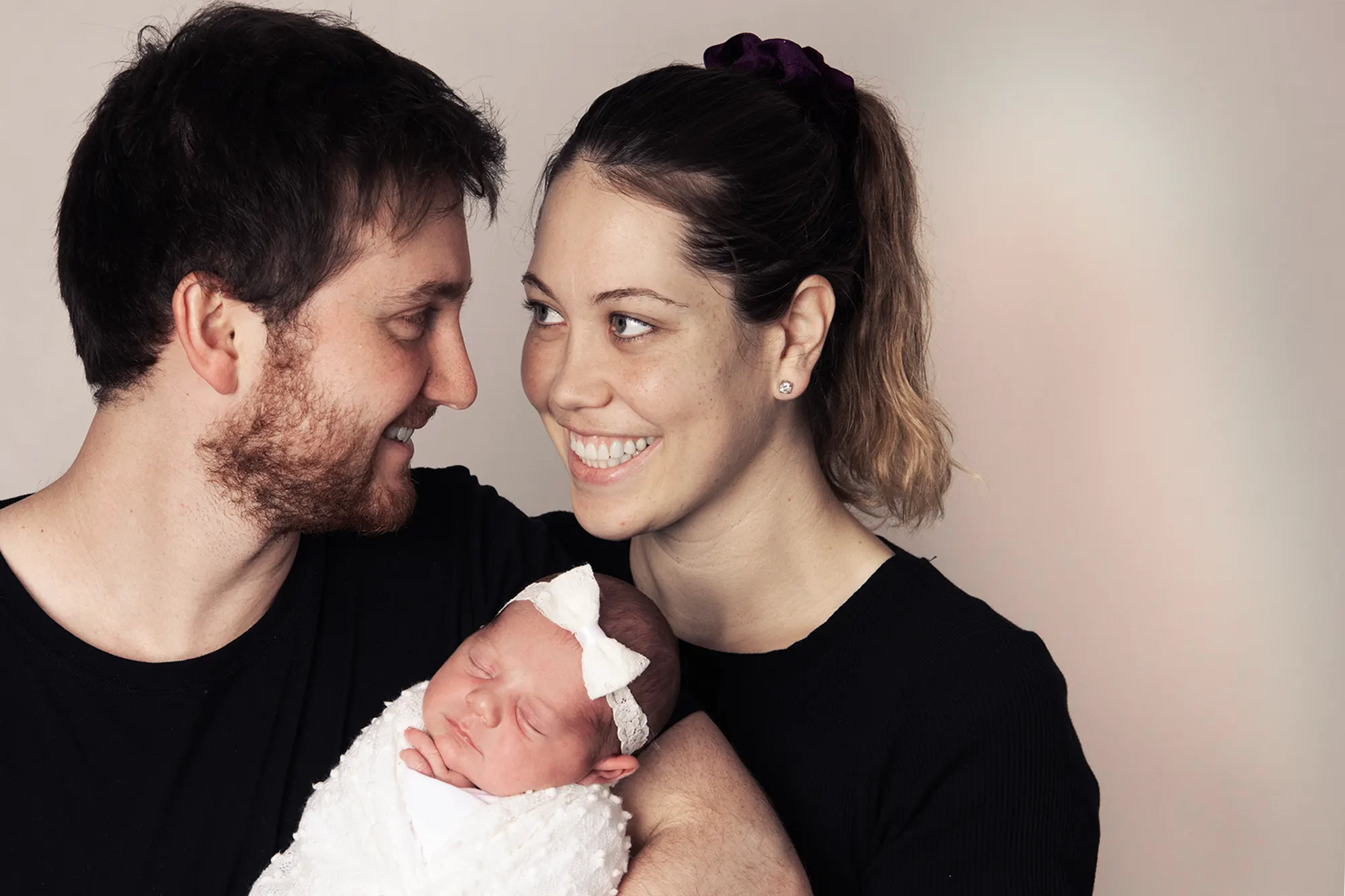 Family portrait of Sian Cockerton's family during a rainy day at Sky Portraits